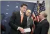  ?? J. SCOTT APPLEWHITE — ASSOCIATED PRESS ?? House Speaker Paul Ryan of Wis., joined by House Majority Whip Steve Scalise of La., right, and Rep. Greg Walden, R-Ore., departs a news conference after responding to reporters about the ouster of Michael Flynn, President Trump’s national security...