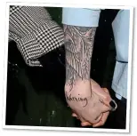  ??  ?? HAND-IN-HAND: Kate clasps Pete’s hand with its ‘warning’ tattoo. Top: She looks sheepish as they leave the club