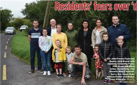  ?? Photo by Michelle Cooper Galvin ?? Cllr John Francis Flynn and Deputy John Brassil with residents Samantha Flynn, Finn, Ruairi and Maria Tyther, Helen Foley, Tina Hanafin, Mike O’Sullivan, Kerry, Eva, Jason, Ruby and Lily Hunter at Ardlahas Cross, Killorglin.