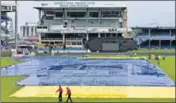  ?? AP ?? Persistent rain at the Queen’s Park Oval forced the umpires to call off the first ODI between India and West Indies.