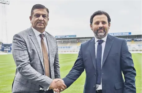  ?? ?? Hartlepool United chairman Raj Singh and manager Paul Hartley pictured in the Suit Direct Stadium.