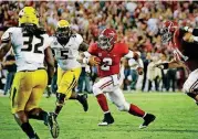  ?? [AP PHOTO] ?? Alabama quarterbac­k Jalen Hurts scrambles for a first down during the second half Saturday against Missouri in Tuscaloosa, Ala.