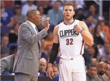  ?? MARK J. REBILAS, USA TODAY SPORTS ?? Blake Griffin, with coach Doc Rivers, is one of numerous Clippers players who could bolt as free agents.