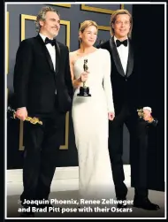  ??  ?? > Joaquin Phoenix, Renee Zellweger and Brad Pitt pose with their Oscars