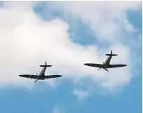  ??  ?? The Spitfires fly over Ditchling.