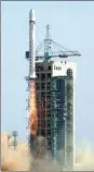  ?? LI SHENGCHENG / FOR CHINA DAILY ?? A Long March 2D rocket carrying several satellites is launched on Friday.