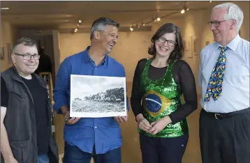  ??  ?? John O’Sullivan, Bill Murphy from Bray Camera Club, Paulo Pimentel and Eilis Taves from Tres Brazilian Cultural Centre at Paulo Pimnetel’s talk in the Mermaid Arts Centre.