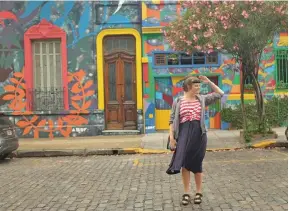  ??  ?? A woman seeking the nearest candy store in Argentina.