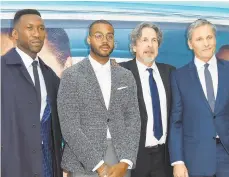  ?? ANGELA WEISS/GETTY IMAGES ?? Actor Mahershala Ali, composer Kris Bowers, writer/director Peter Farrelly and actor Viggo Mortensen at the premiere of ‘Green Book’ Nov. 13 in New York City.