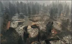  ?? CAROLYN COLE/LOS ANGELES TIMES ?? An ariel view of Paradise off of Clark Road on Thursday. The Camp Fire has burned more than 7,000 structures in Paradise.