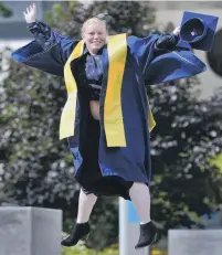  ?? PHOTO: GERARD O’BRIEN ?? Happy day . . . Kathy Howard (31) prepares to graduate from Otago Polytechni­c.