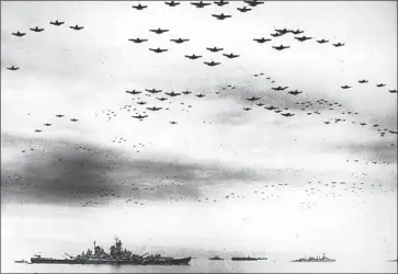  ?? U.S. Navy ?? U.S. NAVY fighter planes fly over the USS Missouri in Tokyo Bay as World War II ends on Sept. 2, 1945.