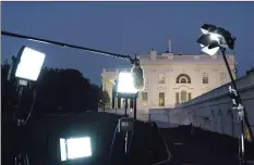  ?? Associated Press ?? Television lights are set up outside the White House on Wednesday.