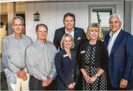  ??  ?? Front, left to right, are Tom Frank, Partners in Building; Parke Patterson, GHBA; Cindy Hinson, HomeAid Houston; Bette Moser, HomeAid Houston; Jim Lemming, Partners in Building. Standing behind them is Lou Palma, Boys and Girls Country at the official...