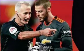  ?? REUTERS ?? Spot of bother: Martin Atkinson and David de Gea