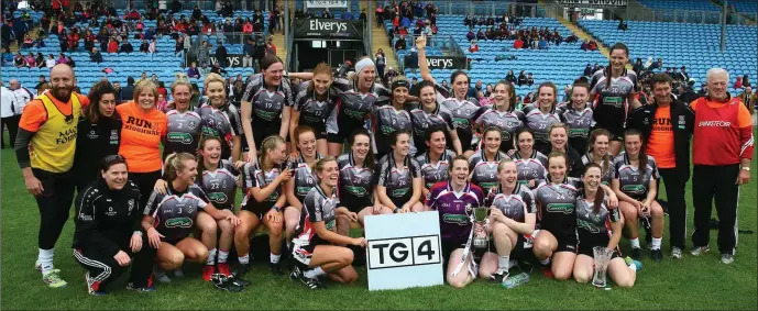  ?? Pics: ?? Sligo ladies and coaches with captain Noelle Gormley celebrate winning the Connacht Intermedia­te title for 2017 in MacHale Park on Sunday. Michael Donnelly.