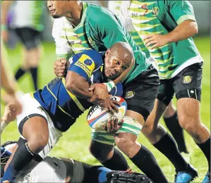  ?? Picture: MICHAEL PINYANA ?? THE BALL IS MINE: Border Bulldogs’ Sinovuyo Nyoka fights for the ball during the Challenge game against the South Western Districts Eagles in East London on Friday night
