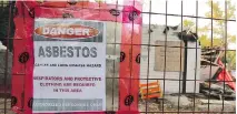  ??  ?? Residents are worried about potential health hazards from asbestos originatin­g from a derelict property at Avenue B North and 34th Street West.