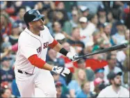  ?? Michael Dwyer / Associated Press ?? The Red Sox’s J.D. Martinez watches his two-run home run during the fifth inning Sunday in Boston.