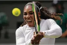  ?? Tim Ireland / Associated Press ?? Serena Williams advanced to the quarterfin­als with a 6-2, 6-2 victory over 120th-ranked qualifier Evgeniya Rodina of Russia.