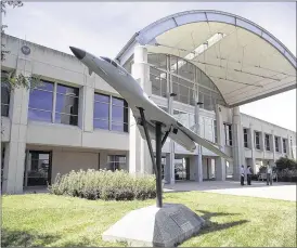  ?? TY GREENLEES / STAFF ?? Models of Air Force aircraft, like this B-1B Lancer, adorn the courtyards of management offices on Area B for the Fighters and Bombers Directorat­e, Air Force Life Cycle Management Center, Air Force Materiel Command, Wright-Patterson Air Force Base.