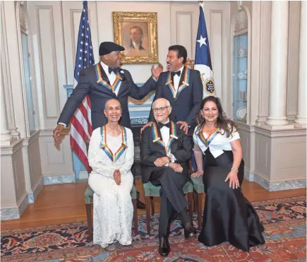  ??  ?? Front row: 2017 Kennedy Center Honorees dancer Carmen de Lavallade, TV writer/producer Norman Lear (who is 95) and singer Gloria Estefan; back row: rapper LL Cool J (the youngest, at 49) and singer Lionel Richie. KEVIN WOLF/AP