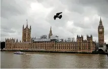  ?? PHOTO: REUTERS ?? Birds fly past the Houses of Parliament, in central London. Britain’s parliament was hit by a cyber attack in which hackers tried to access email accounts, politician­s and officials said.