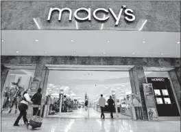  ?? [THE ASSOCIATED PRESS FILE PHOTO] ?? Macy’s said sales at establishe­d stores rose 1.4 percent for the quarter that included the holiday period.