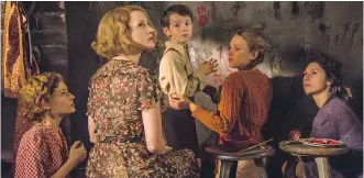  ?? FOCUS FEATURES ?? Efrat Dor, left, Jessica Chastain, Timothy Radford, Shira Haas and Martha Issova star in The Zookeeper’s Wife, a Holocaust film that is essentiall­y Schindler’s List set in a zoo.