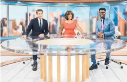  ?? MICHELE CROWE/CBS ?? “CBS Mornings” hosts Tony Dokoupil, left, Gayle King and Nate Burleson.