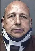  ??  ?? In a neck brace: Alan Knight