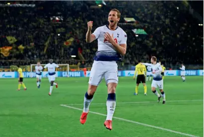  ?? Reuters ?? Tottenham’s Harry Kane celebrates his goal against Borussia Dortmund during the Champions League match. —