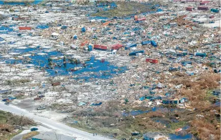  ?? AFP-Yonhap ?? An aerial view of floods and damages from Hurricane Dorian on Freeport, Grand Bahama, Thursday.