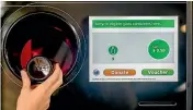  ?? ?? A reverse vending machine for glass bottles in Australia. Kiwis could be using these by 2025.