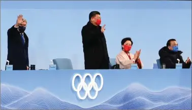  ?? ?? China’s President Xi Jinping (second from left) waves during the closing ceremony of the 2022 Beijing Winter Olympics, on 20 February. REUTERS