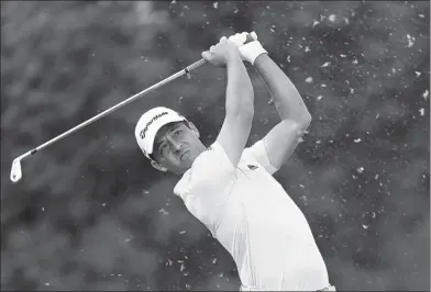  ?? ANDREW REDINGTON / GETTY IMAGES ?? Xander Schauffele of the United States plays a shot during the opening round of the WGC-HSBC Champions at Shanghai’s Sheshan Internatio­nal Golf Club on Oct 26.