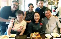  ??  ?? BIRTHDAY GIRL. Grand Hope’s Angelita “Baby” Dy (seated center) with her birthday cake. She is flanked by husband Nelson Dy and Grace Tan. At the back are GTMC’s Samson Tan, Resort World’s Annie Ico Tingzon and SilkAir Philippine­s manager Jake Jeow.