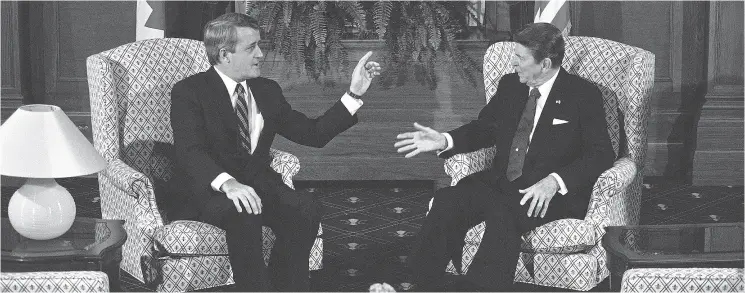  ?? SCOTT APPLEWHITE / THE CANADIAN PRESS FILES ?? As leaders of Canada and the United States, Brian Mulroney and Ronald Reagan, shown in Quebec City at their first round of talks in 1985, eventually became friends.