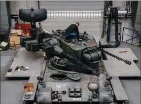  ?? (The New York Times/Felix Schmitt) ?? A mechanic works on a German army Gepard self-propelled antiaircra­ft gun at the Krauss-Maffei Wegmann factory in Munich in late April.