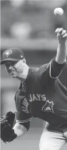  ?? CHRIS O’MEARA/THE ASSOCIATED PRESS ?? Toronto Blue Jays starting pitcher J.A. Happ is drawing heavy trade interest from other clubs.