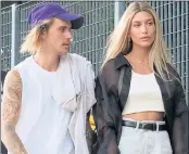  ?? NICHOLAS HUNT — GETTY IMAGES ?? Justin Bieber and Hailey Baldwin attend a New York Fashion Week event last week. The pair was seen at the New York City Marriage Bureau on Thursday.