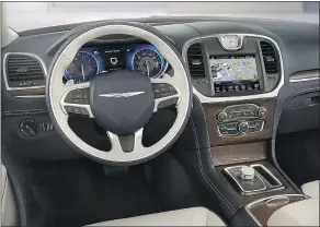  ??  ?? The Chrysler 300C Platinum’s cabin is a segment beater.