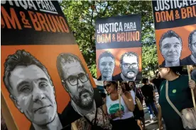  ?? Photograph: Bruna Prado/AP ?? Activists commemorat­e the one-year anniversar­y of the murders of Bruno Pereira and Dom Phillips in Rio de Janeiro, Brazil, on 5 June 2023.