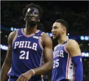  ?? ELISE AMENDOLA — THE ASSOCIATED PRESS ?? 76ers center Joel Embiid (21) and guard Ben Simmons (25) have words during Game 2 of a second-round playoff series against the Celtics last season.