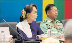  ?? EPA ?? Aung San Suu Kyi speaking during the commemorat­ion of the third anniversar­y of the signing of Myanmar’s Nationwide Ceasefire Agreement on Monday.