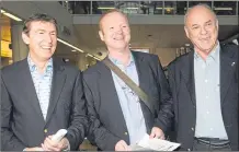  ??  ?? Gordon Smith, Alex Mcleish and SFA president George Peat on their way to the draw for the 2010 World Cup qualifiers