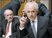  ?? J. SCOTT APPLEWHITE/AP ?? Sen. Bob Corker, R-Tenn., right, expressed reservatio­ns about what got accomplish­ed at Tuesday’s summit.