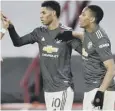  ??  ?? 0 Marcus Rashford celebrates after scoring United’s third.