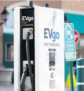  ?? NAM Y. HUH/AP ?? An electric vehicle charging station in Northbrook, Illinois. President Biden’s infrastruc­ture plan calls for a network of 500,000 electric vehicle chargers by 2030.