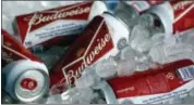  ?? THE ASSOCIATED PRESS ?? It was announced Wednesday that Budweiser maker Anheuser-Busch InBev will pay $6 million to the Securities and Exchange Commission to settle charges that the company made improper payments to government officials in India to promote its products and...